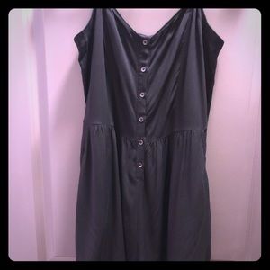 Detailed hem, button front black romper